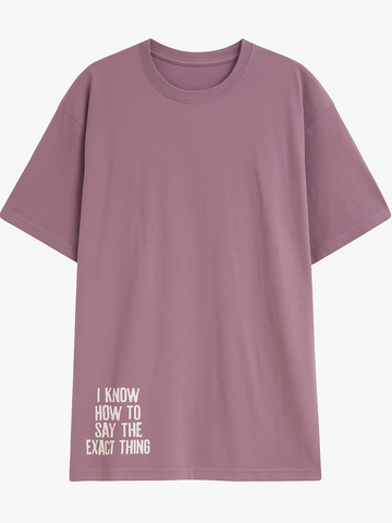 Olive pink graphic tee with white text I know how to say the exact thing on bottom left